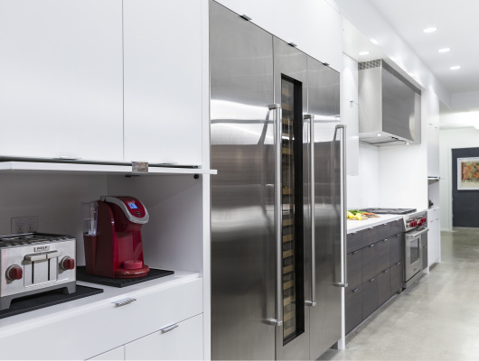 kitchen with fridge, coffee maker and toaster